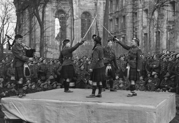 Highland Dance by men of the 810th (Service) Battalion, The Gordon Highlanders outside Arras Cathedral, 24 January 1918 IWMc