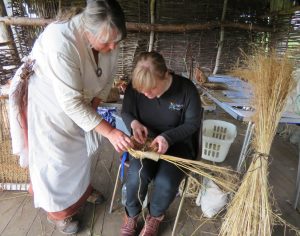 Elaine showing Rachael the ropes. Or strands.