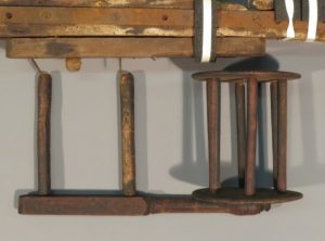 The brackets and drum bobbins were thought to belong to the same object as they all fitted well and matched to the nails protruding from the central upright.