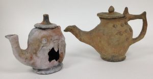 Rachael’s fabulous teapot next to the original. The hole appeared very early on in the firing; it probably exploded due to the concentrated heat on the relatively thin clay walls 