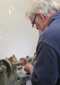 Bill using the machine polisher