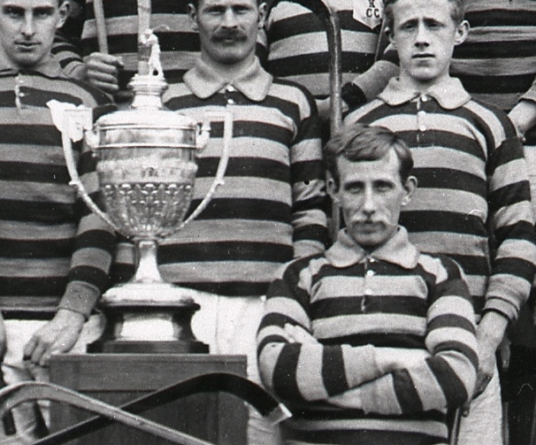John Dallas, with the Kingussie team and the Camanachd Cup in 1900. Image credit: High Life Highland, Highland Folk Museum