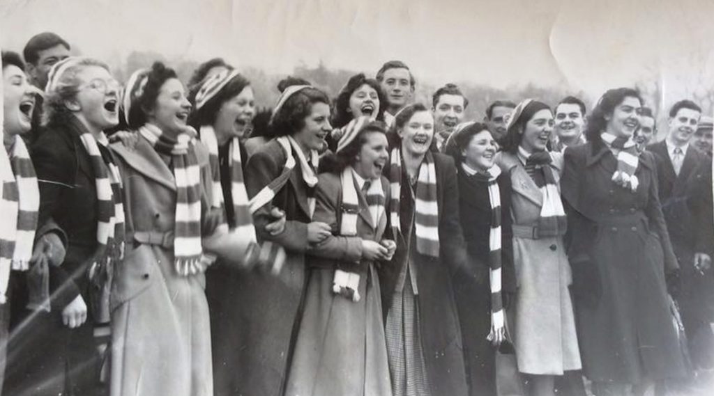 Newtonmore supporters cheering at a match, 1951. Image courtesy of Hugh Dan MacLennan/Jack Richmond Collection