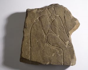 Pictish symbol stone showing the head of a deer or a horse