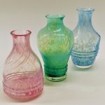3 vases from the Concerto range in pastel colours, by Caithness Glass