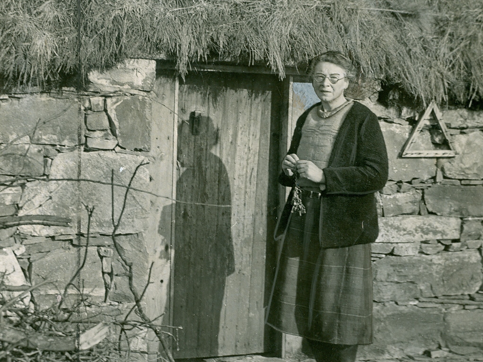 A black and white photo of Dr Isabel Grant, founder of the Highland Folk Museum
