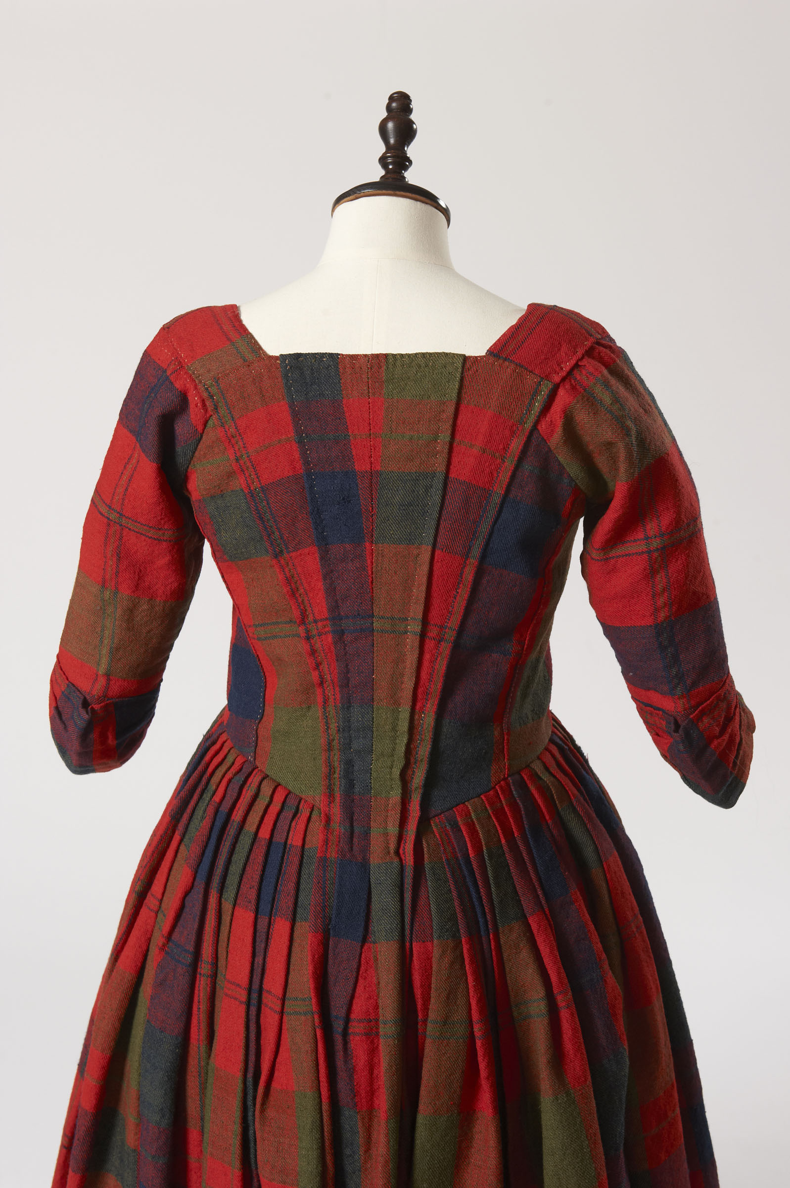View of the pleated back of the tartan wedding dress worn by Isabella MacTavish for her wedding, 1785