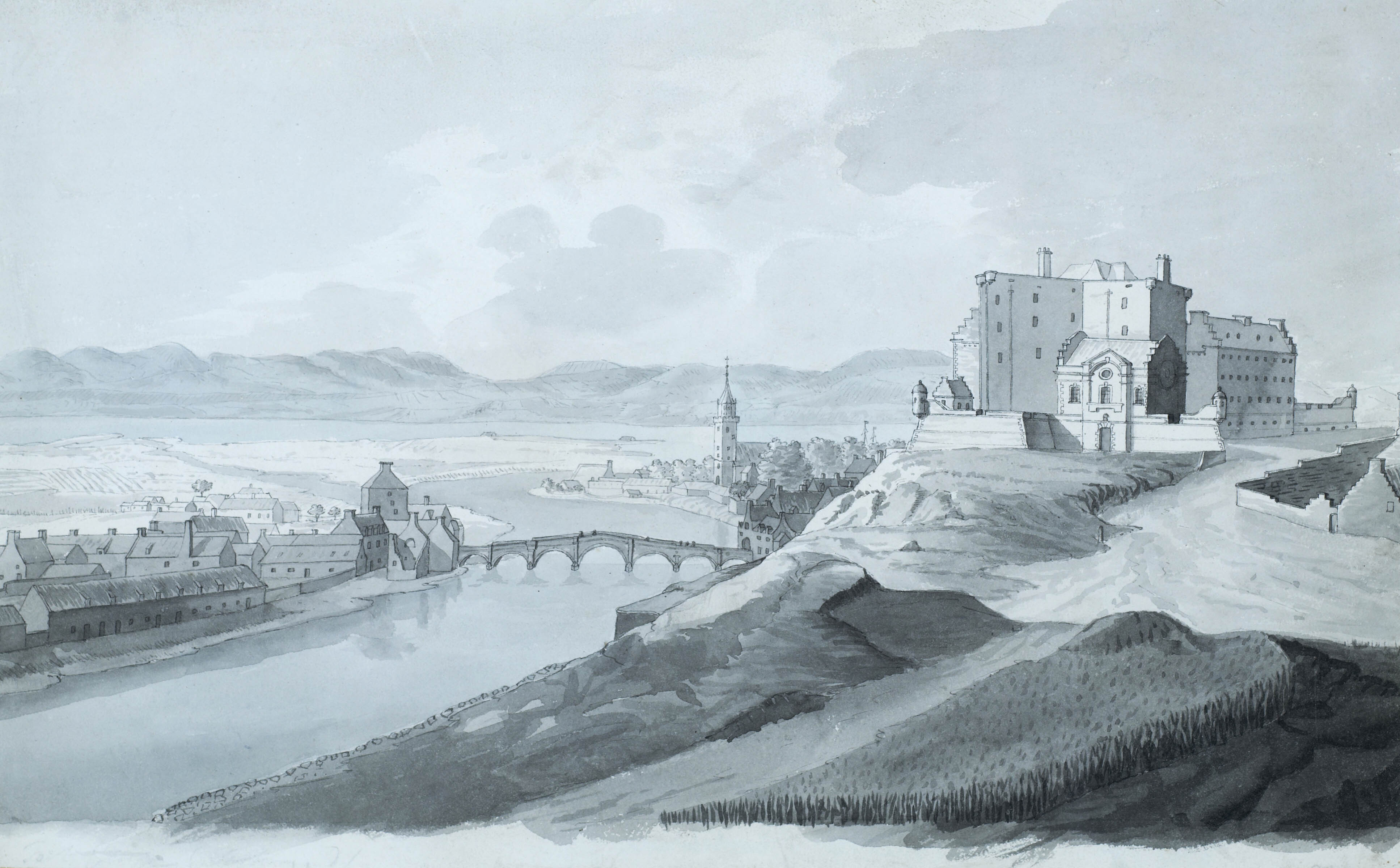 An ink drawing of a large rectangular fort with a wall around, sited on top of a hill with a view down to the town, which has a river winding through it.  There is a bridge with seven arches crossing the river and a hilly landscape in the background.