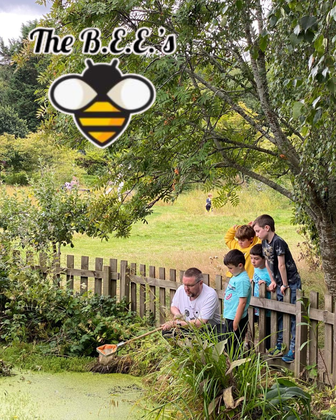 A group of children looking into a pond with a logo of a bee for Botanic Eco Explorer's Junior Botany group.