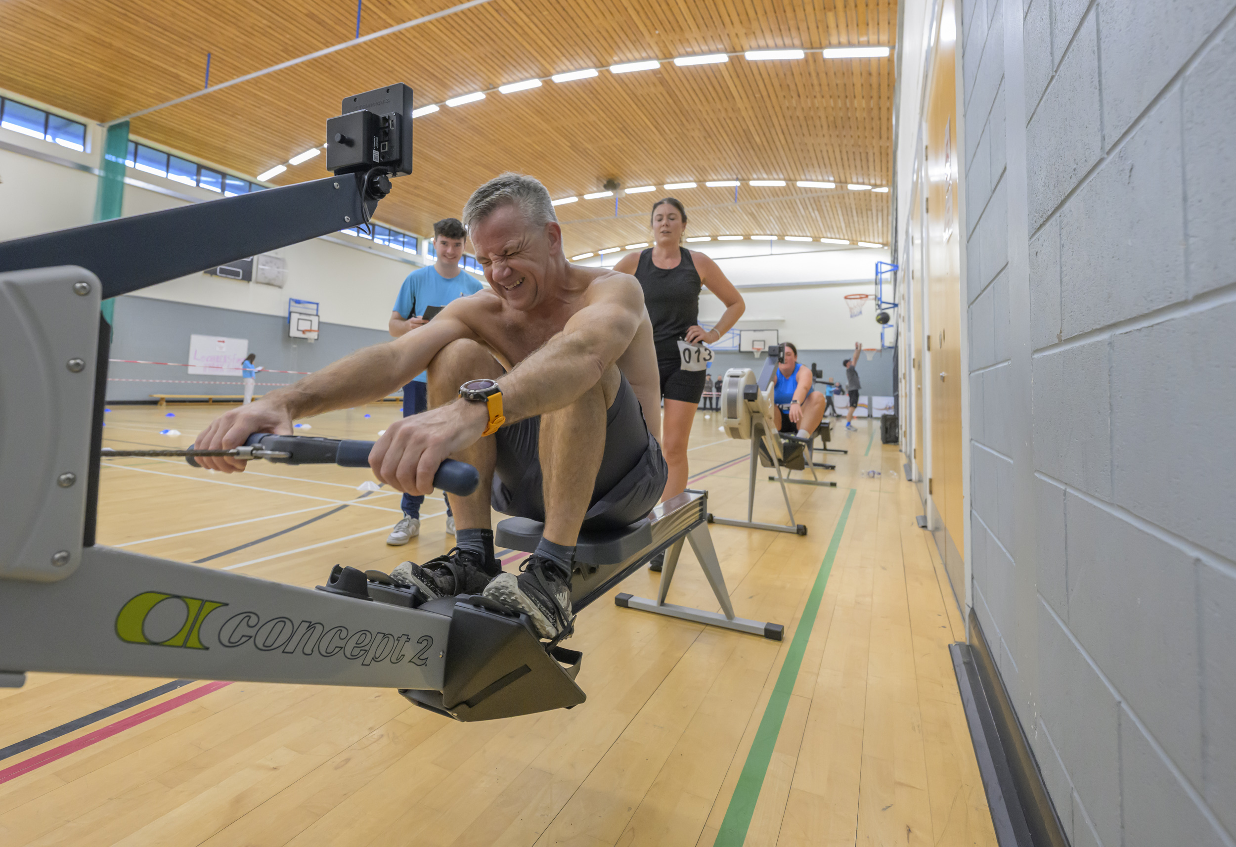 Man on rowing machine during HYROX Sim at Lochaber