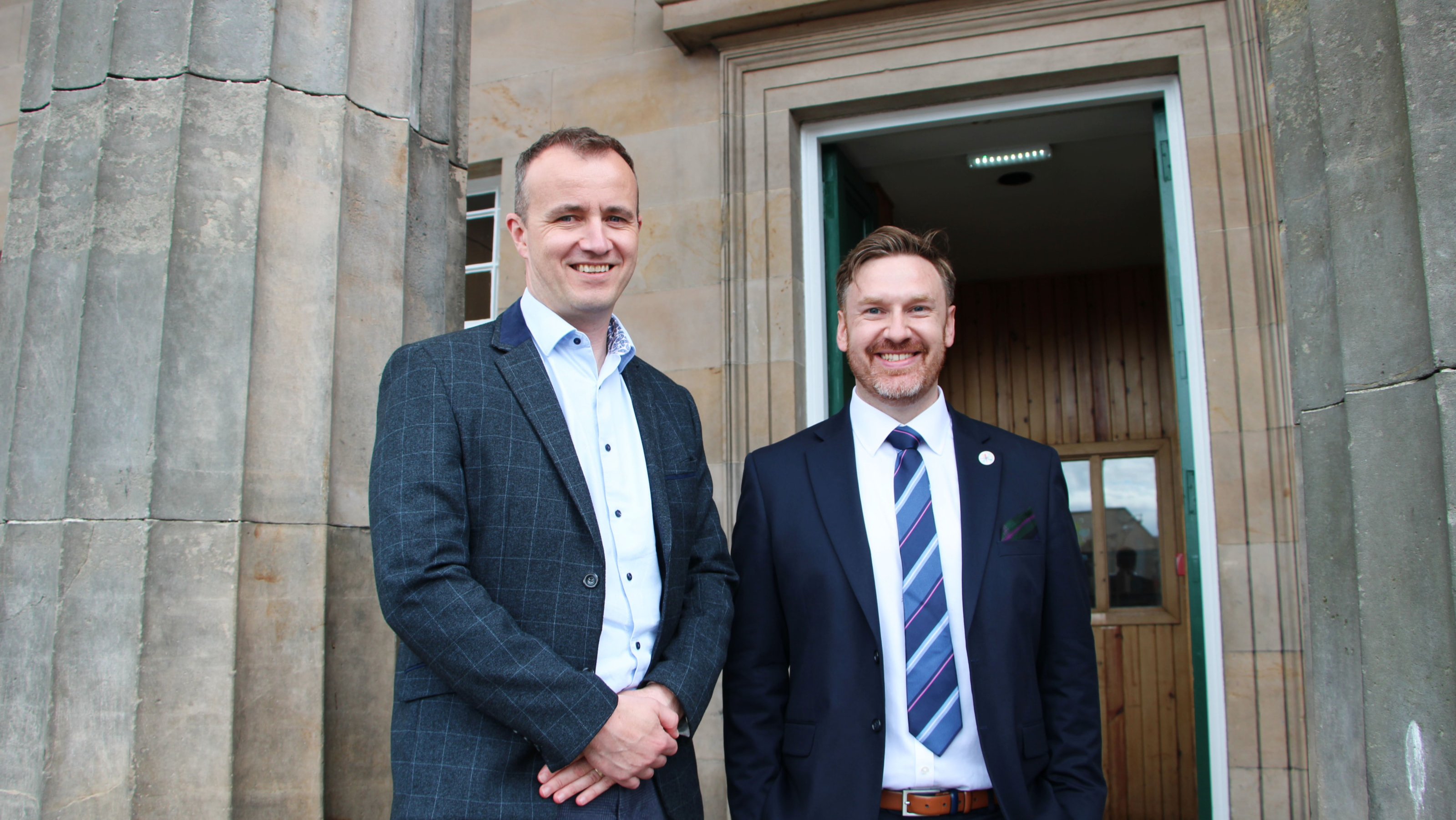 Michael Boylan (left) and Michael Golding (right) standing outside Inverness Library.