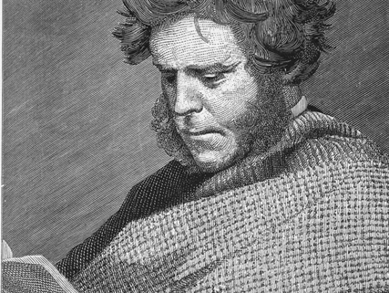 Engraved portrait of a seated figure with wavy hair, wrapped in a textured patterned shawl and holding an open book. The background is plain. Text beneath the image reads ‘HUGH MILLER.