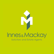 Logo for Innes & Mackay featuring a geometric white and teal ‘M’-shaped symbol above the text ‘Innes & Mackay’ in dark green and ‘Solicitors and Estate Agents’ below on a bright lime green background.