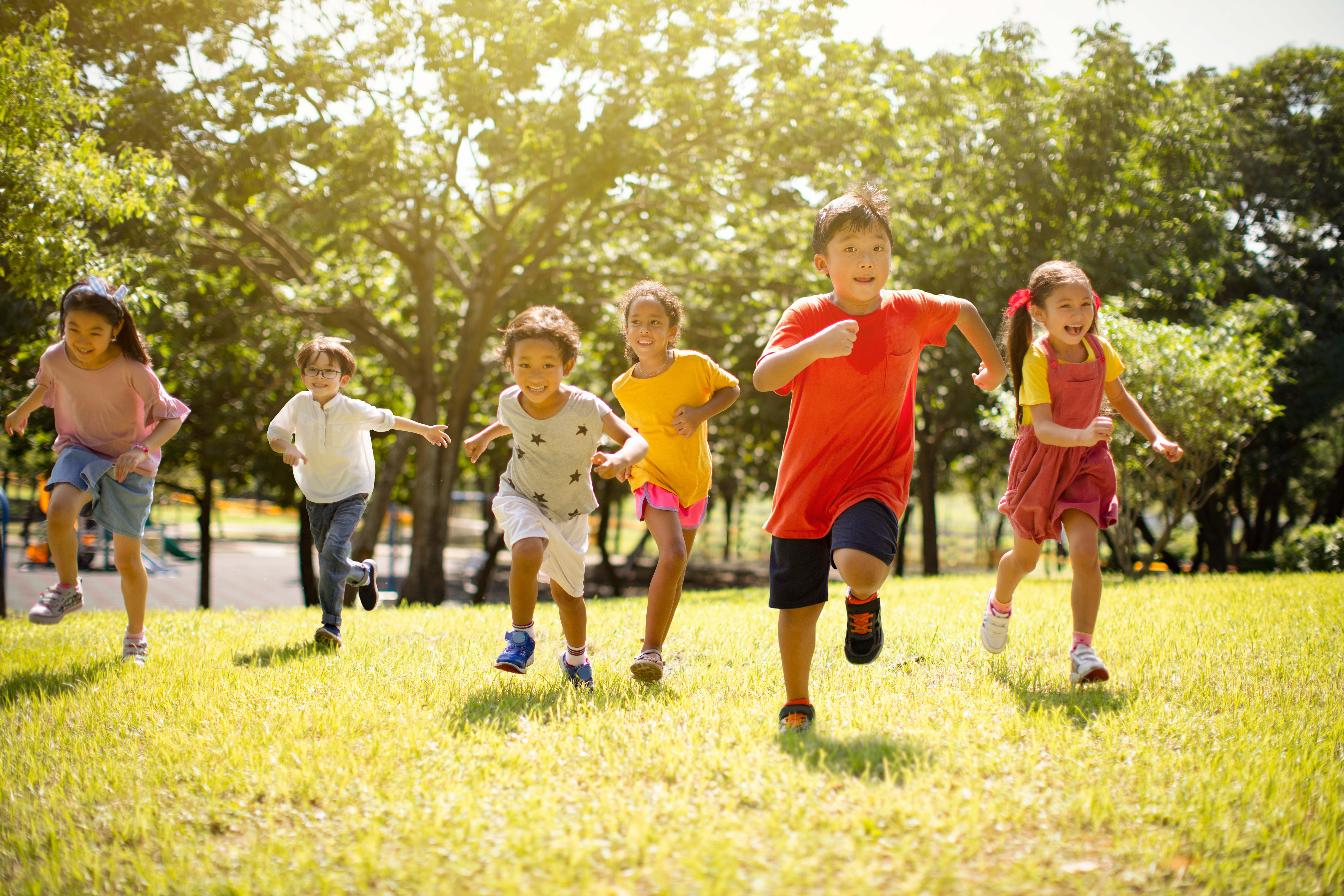 Children running and playing outdoors