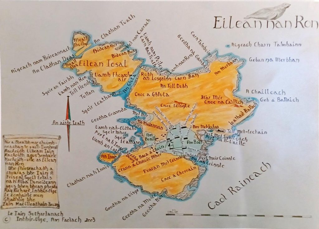 A hand-drawn, colored map titled “Eilean nan Ròn” (Island of Seals) with detailed Gaelic place names. The map shows the island divided into two main areas labeled Eilean Iosal and the larger section of Eilean nan Ròn, shaded in orange with blue coastal outlines. Various geographic features are marked, including hills, lochs, and headlands, such as Blàr Mòr, Cnoc na Caillich, and Am Meidhleach. A decorative compass rose appears on the left, and a scale bar at the bottom indicates distances in miles. In the lower-left corner, there is a text box with additional Gaelic notes, and at the top right, an illustration of a seal accompanies the title. The map has an artistic style with handwritten labels and soft color shading.