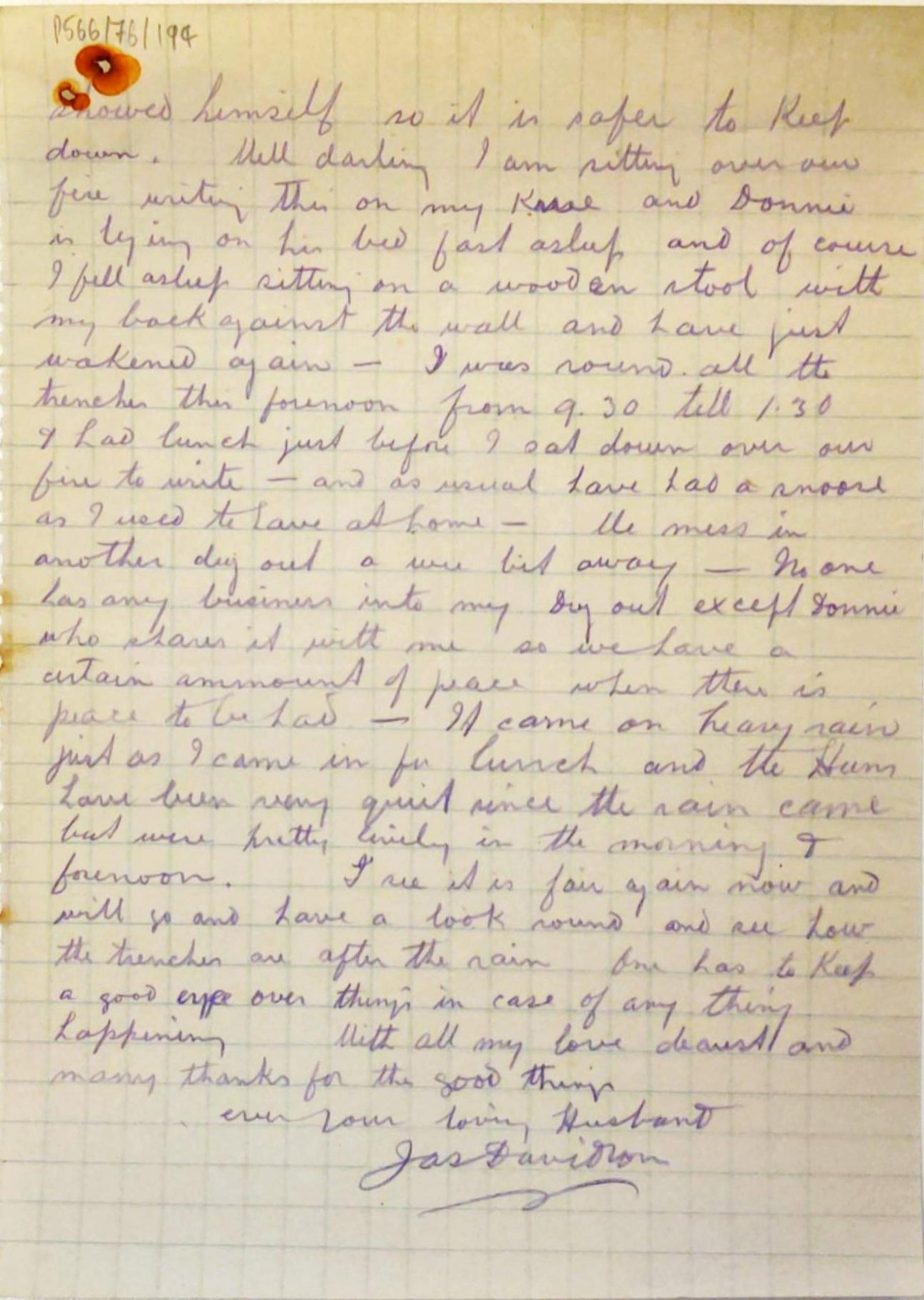 A piece of squared paper covered with handwriting in purple pencil