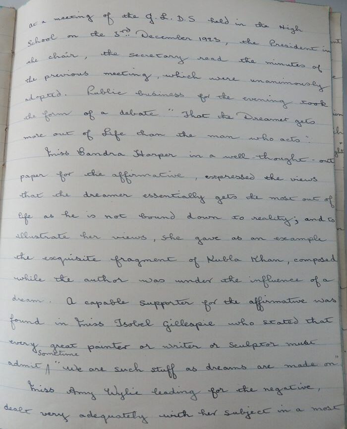 A page from a book showing neat black ink writing on lined paper