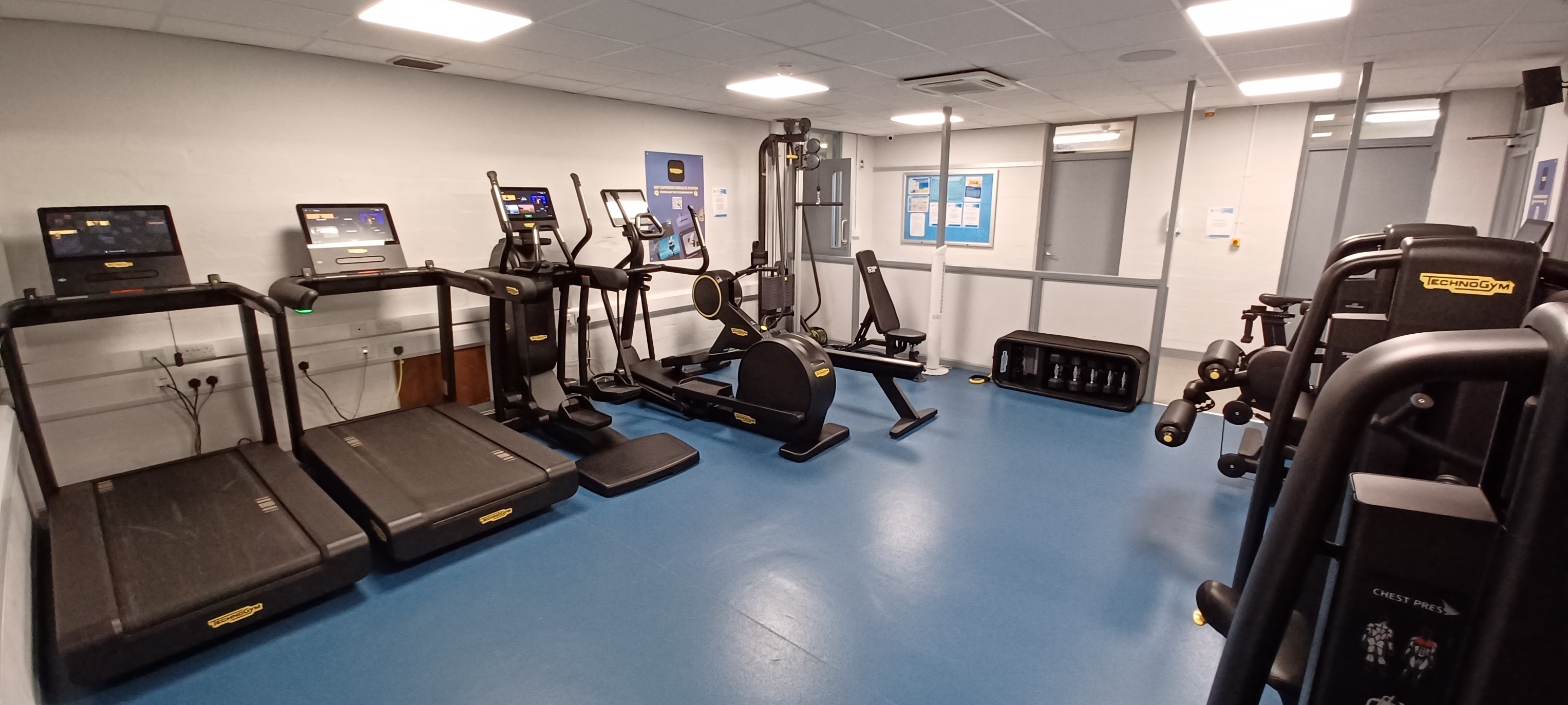 Spacious gym equipped with various equipment