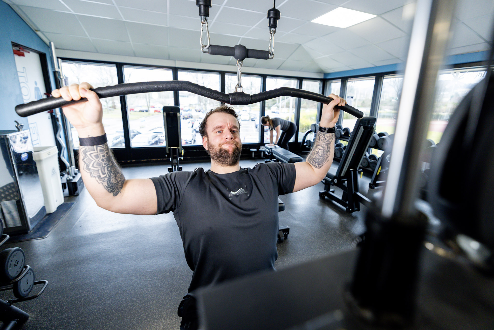 Man using the lat pulldown machine at Inverness Leisure gym