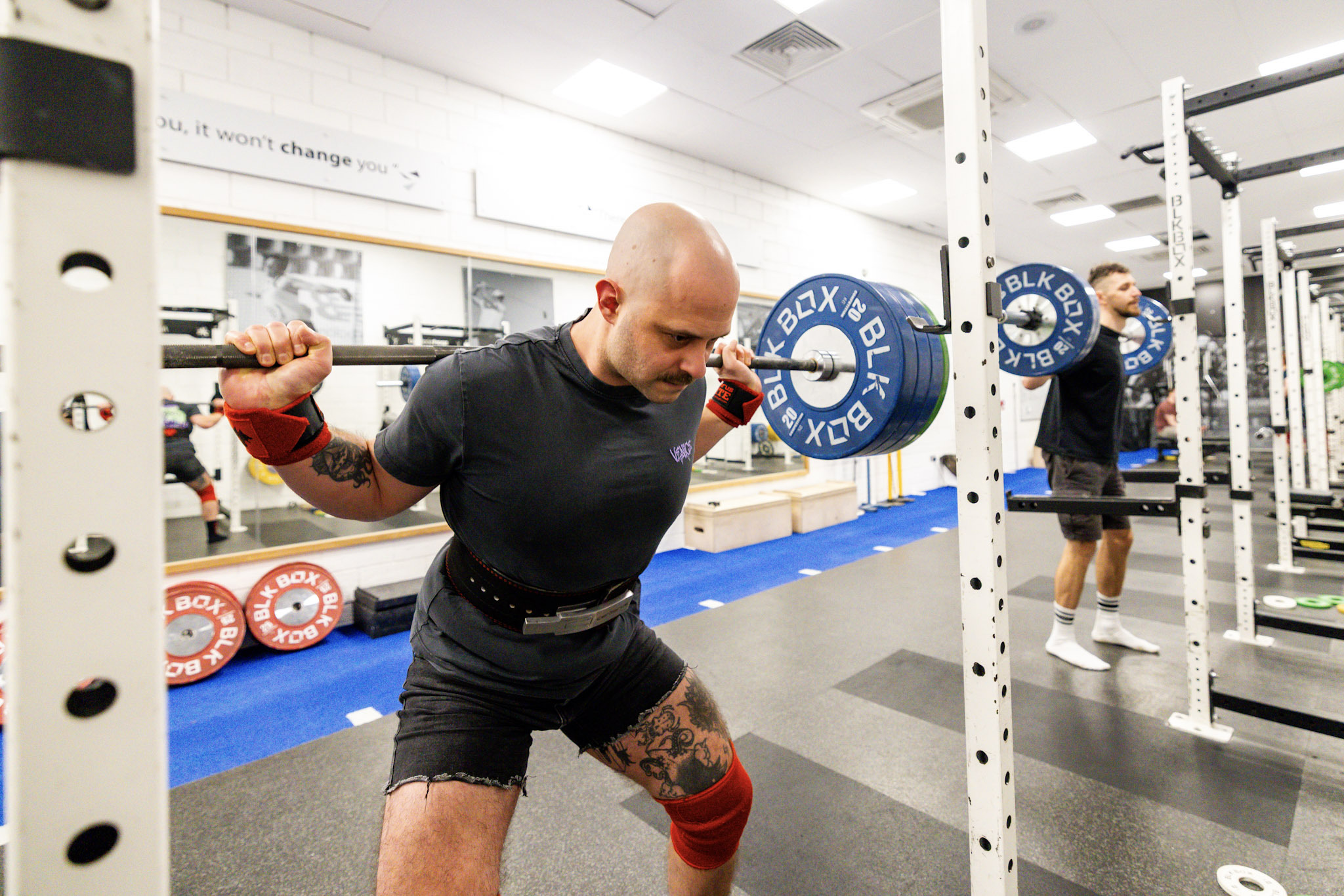 Man training with a barbell at Inverness Leisure gym