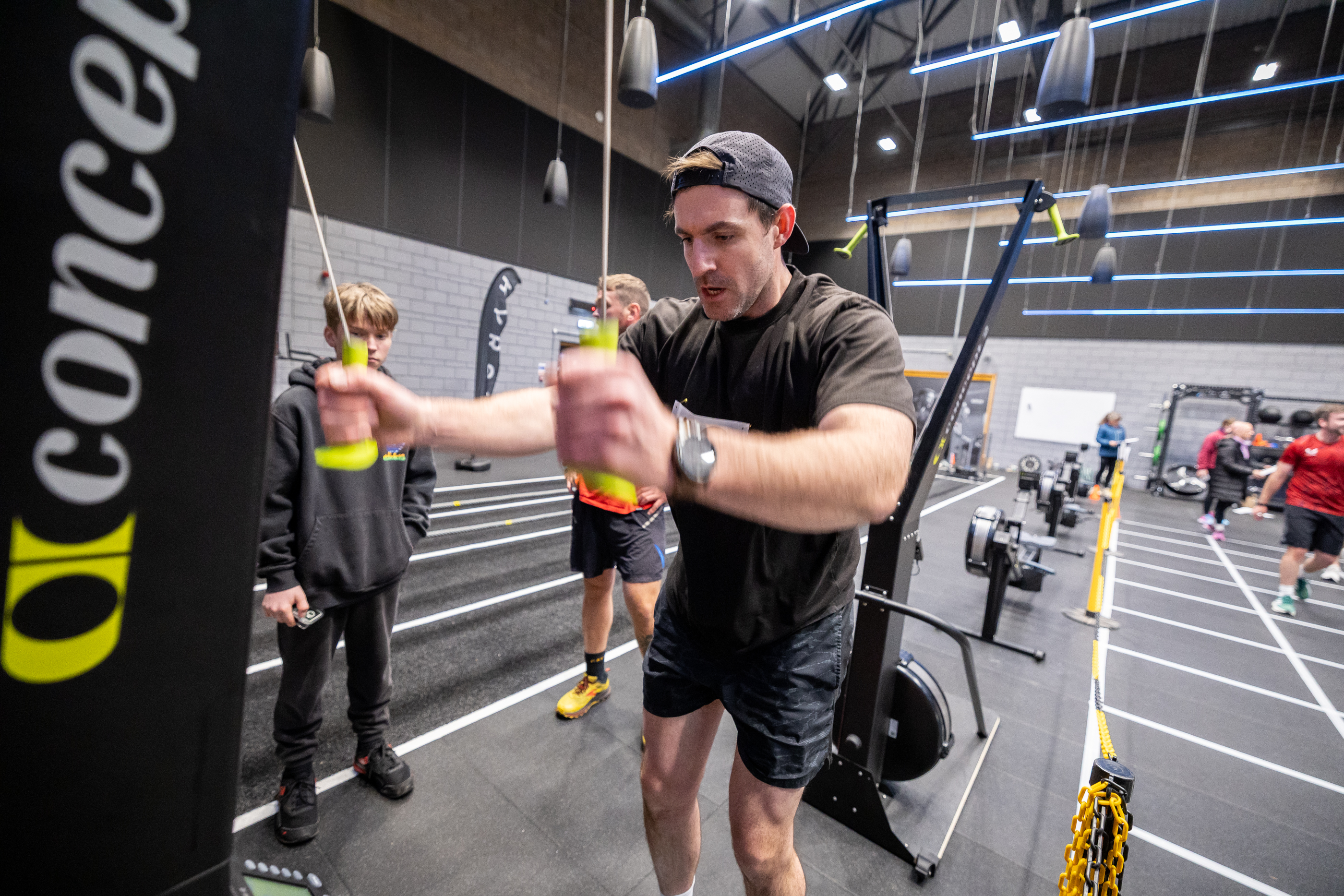 Man using ski erg pull handles at the HYROX studio, Inverness Leisure