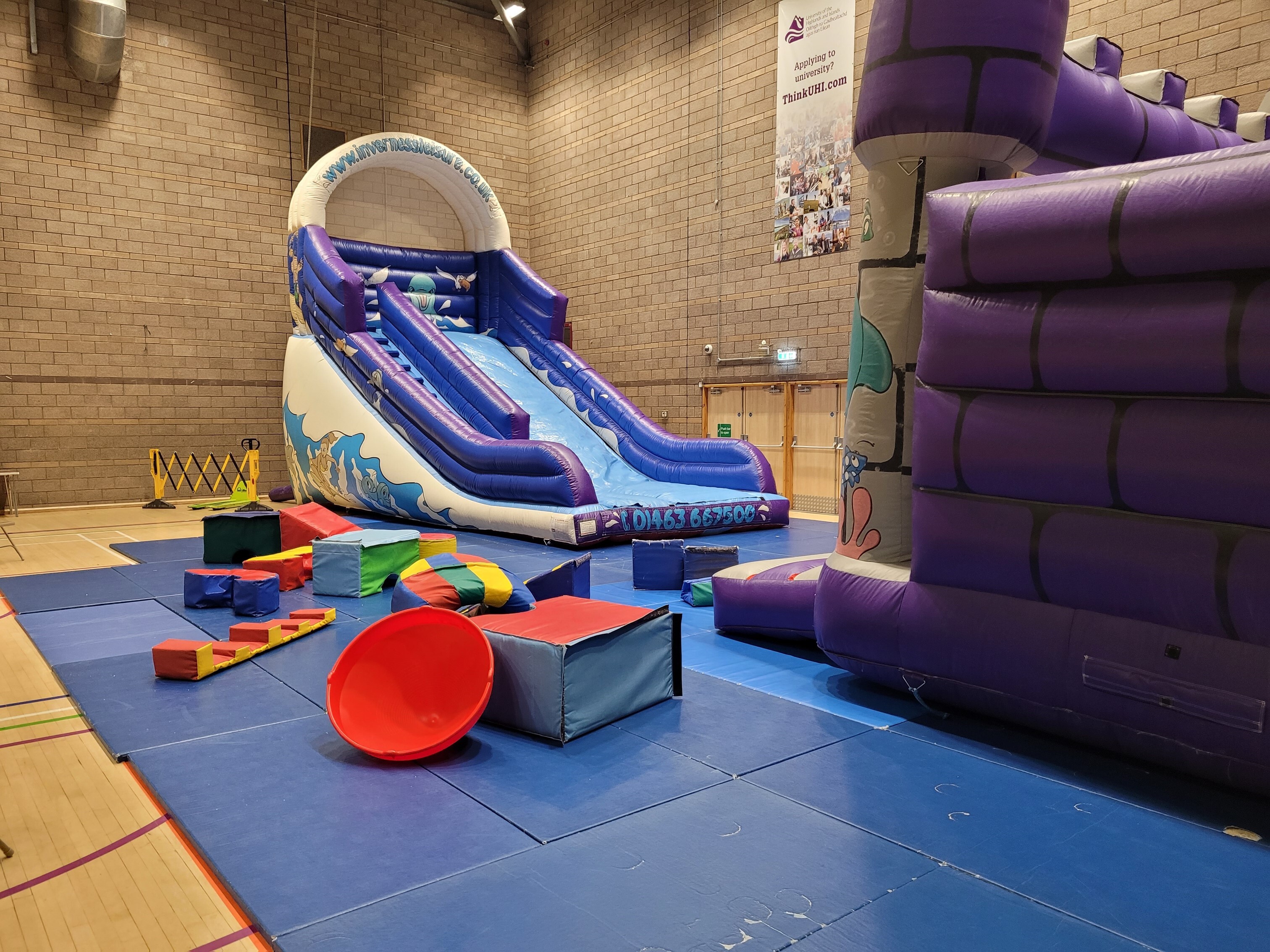 Inflatable play equipment, which includes a slide.