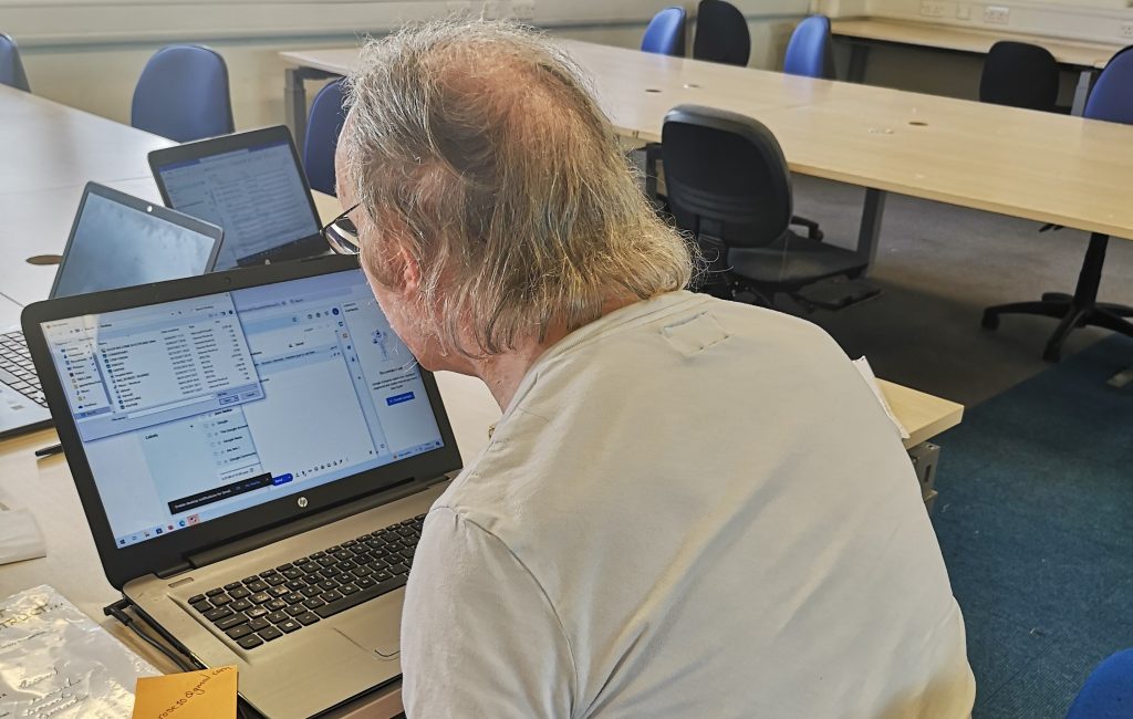 Leonard, an Adult Learner, learning about computers
