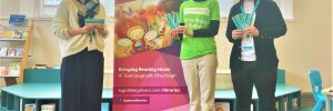 High Life Highland and Samaritans staff members showcase bookmarks at Inverness Library