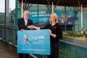 Left to Right: Nigel Scott (Denchi Group CEO) and Emma Thomson (High Life Highland’s highlife Development Manager) shake hands at Inverness Leisure to announce corporate membership deal